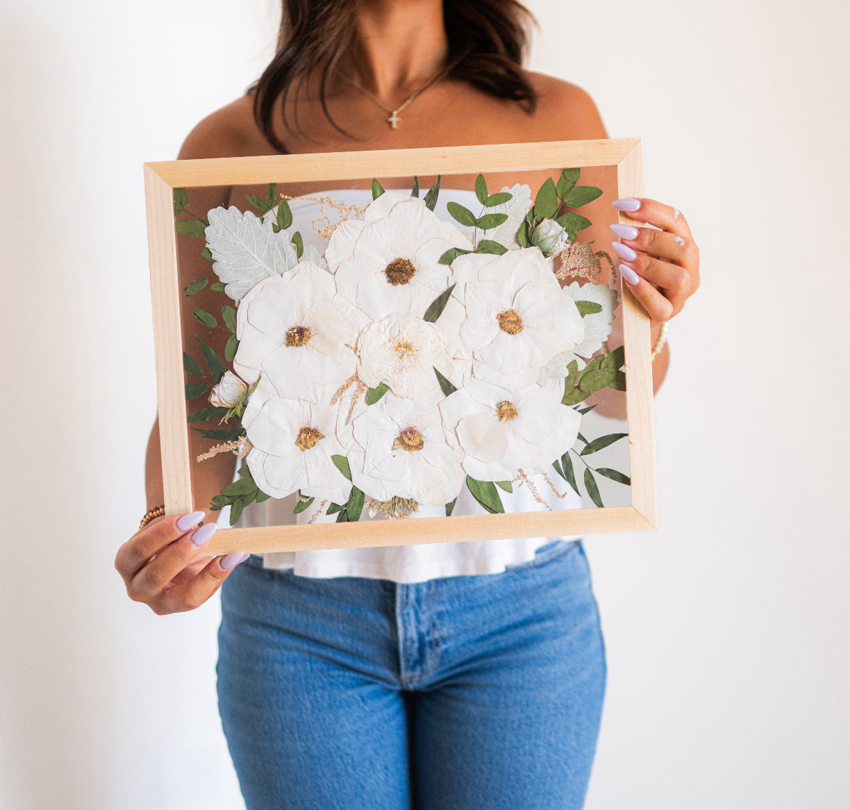 wooden frame with a pressed floral 