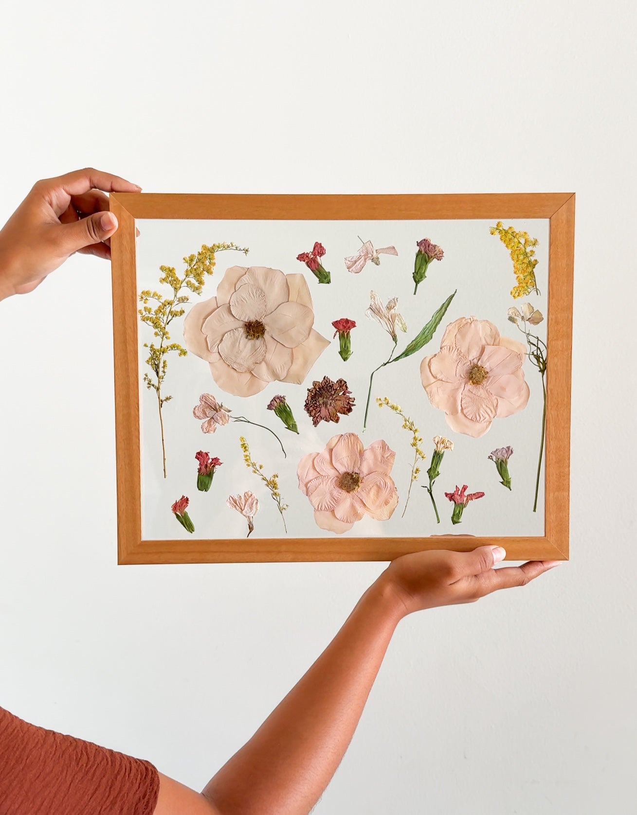 frame with a pressed floral arrangement 