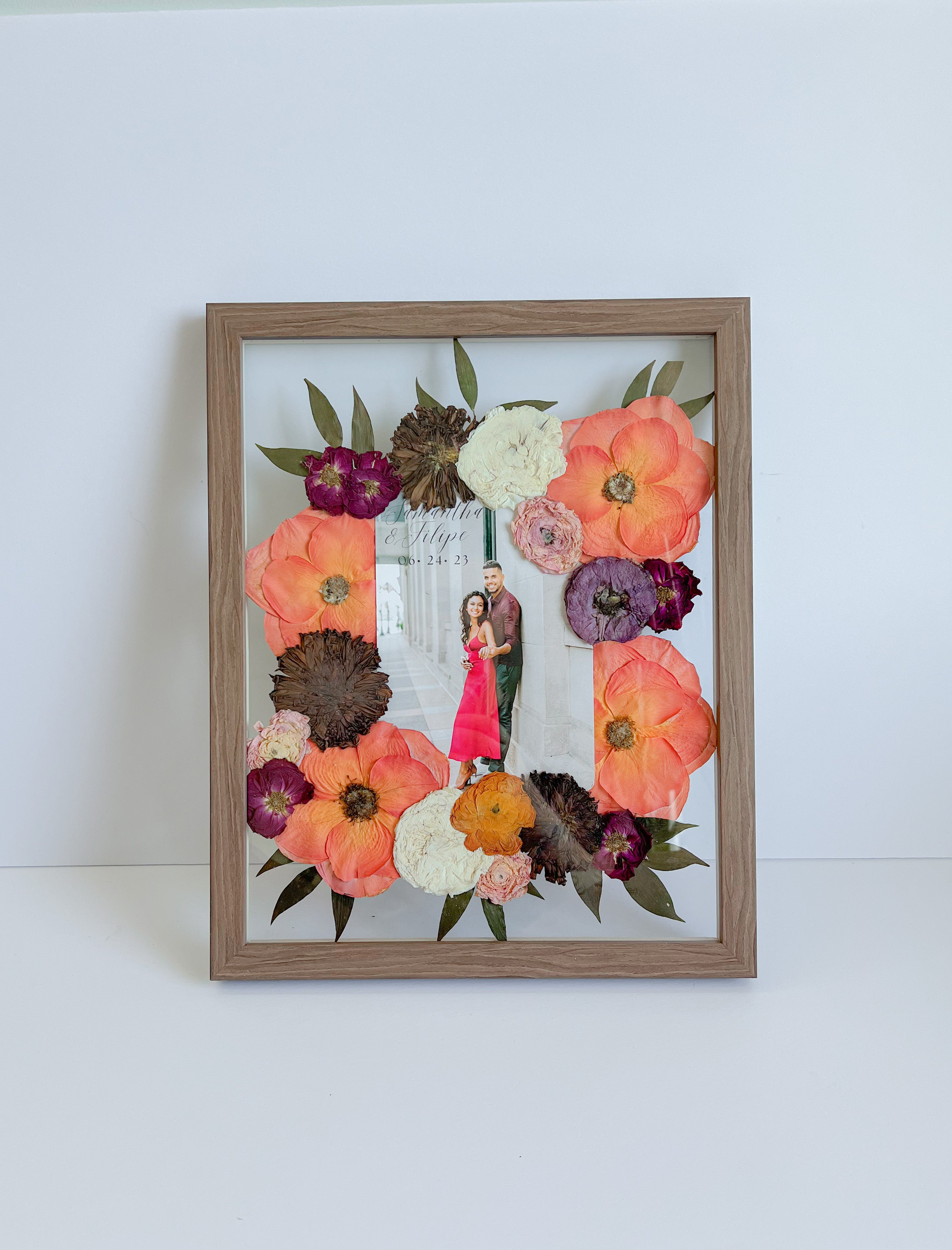 flower preservation frame with couple pic inside